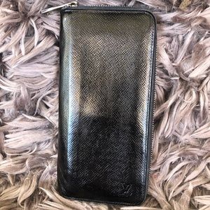 Louis Vuitton Tiaga Vertical Zippy wallet